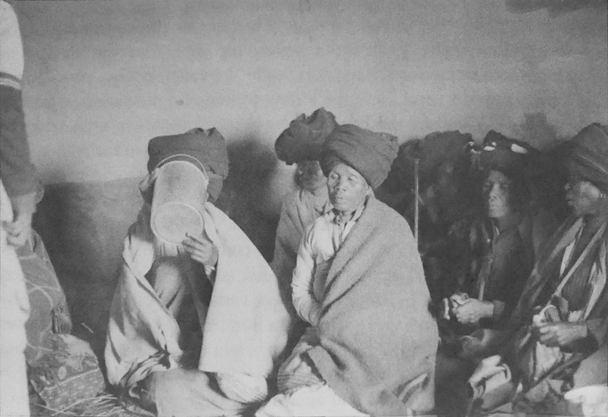 Xhosa beer-party. Women in hut attending a beer-party, 1980